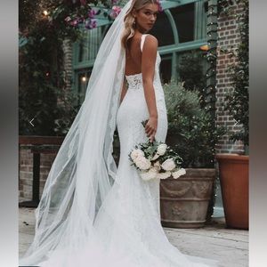 Lumi Grace Loves Lace wedding gown